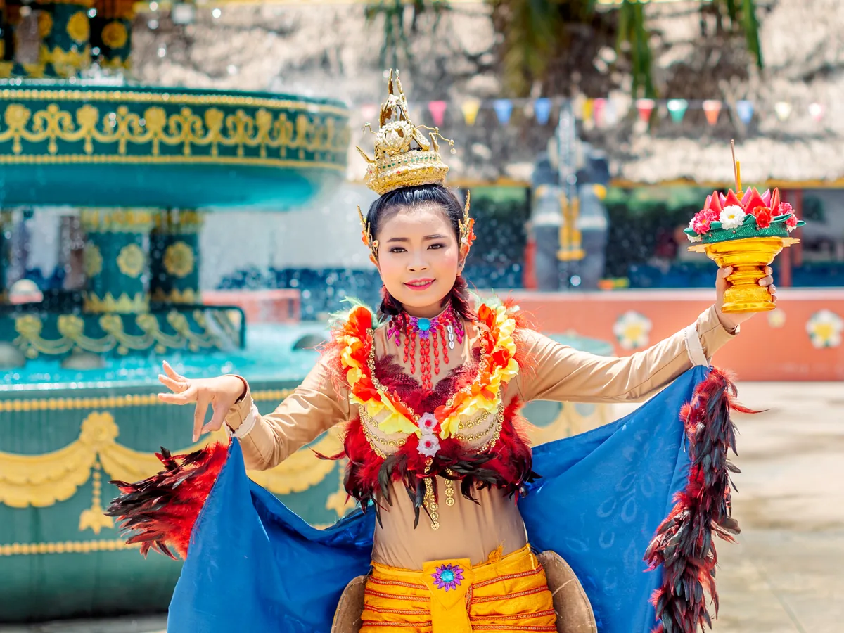 Traditional Thai classical dancers in bright costumes